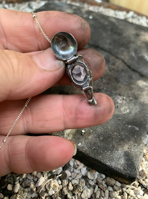 Amethyst and crow skull locket talisman